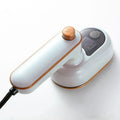 Roomlift Mini Rotating Steam Iron in white — studio