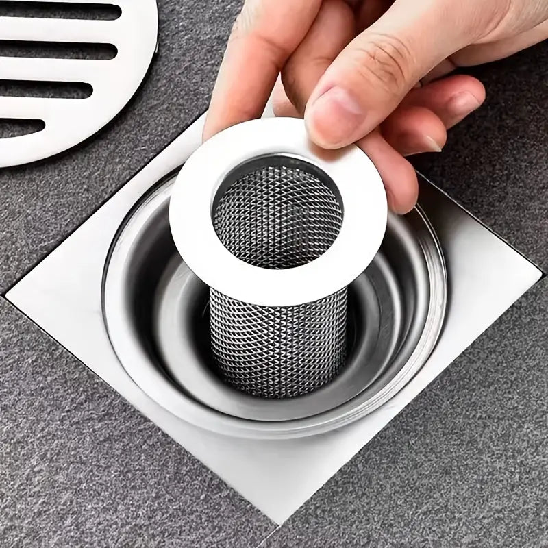 Roomlift drain strainer in a floor drain