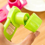 Roomlift garlic press grater detail in hand