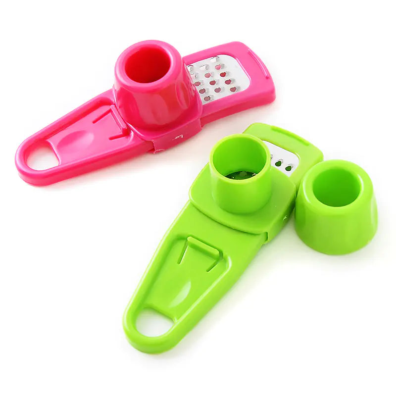 Roomlift garlic and ginger press in two colours